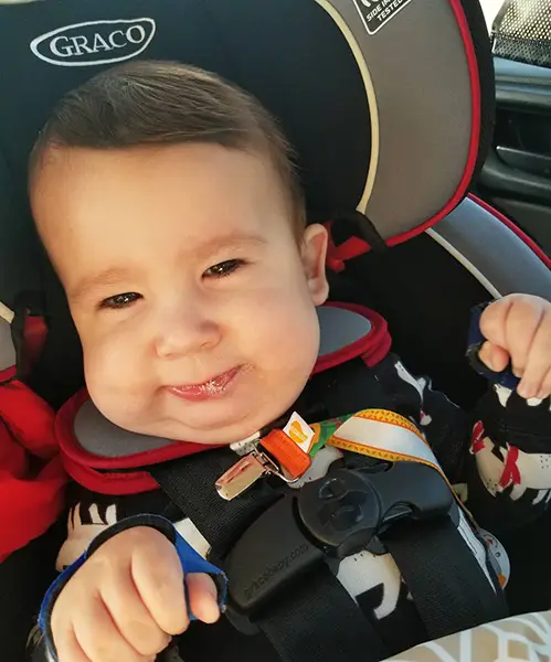 Gabriel in his car seat