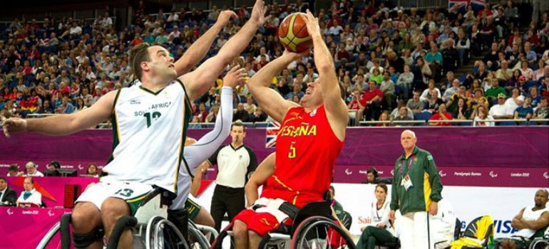 Men playing wheelchair basketball