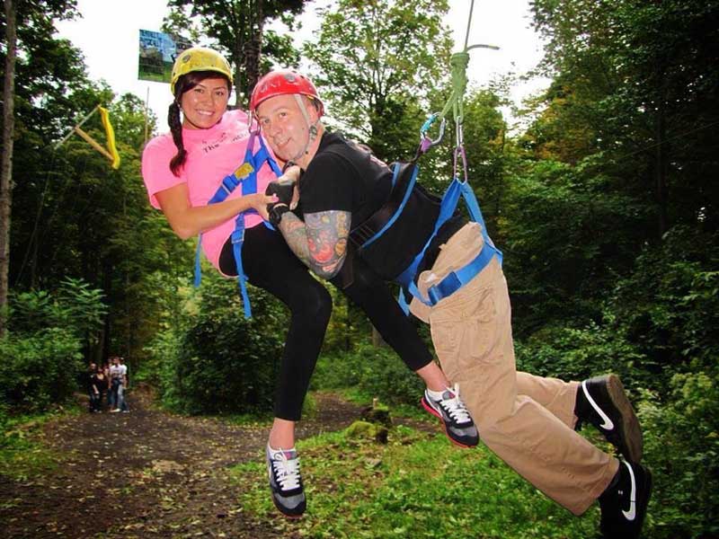 Jess zip-lining with her husband