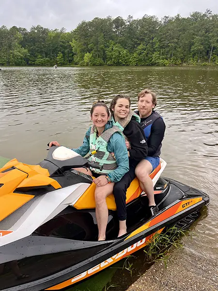 Eden jetskiing with friends